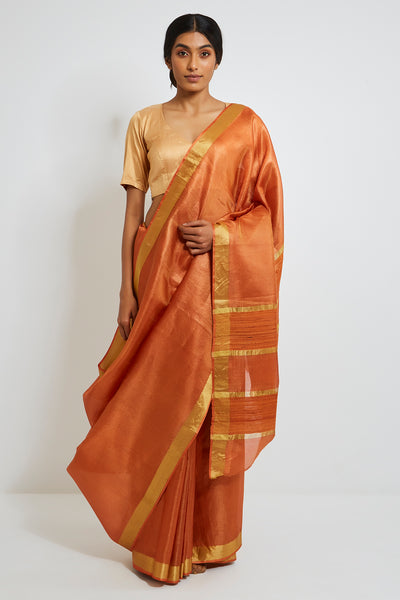 Via East orange handloom pure tissue silk saree with gold zari border and pallu
